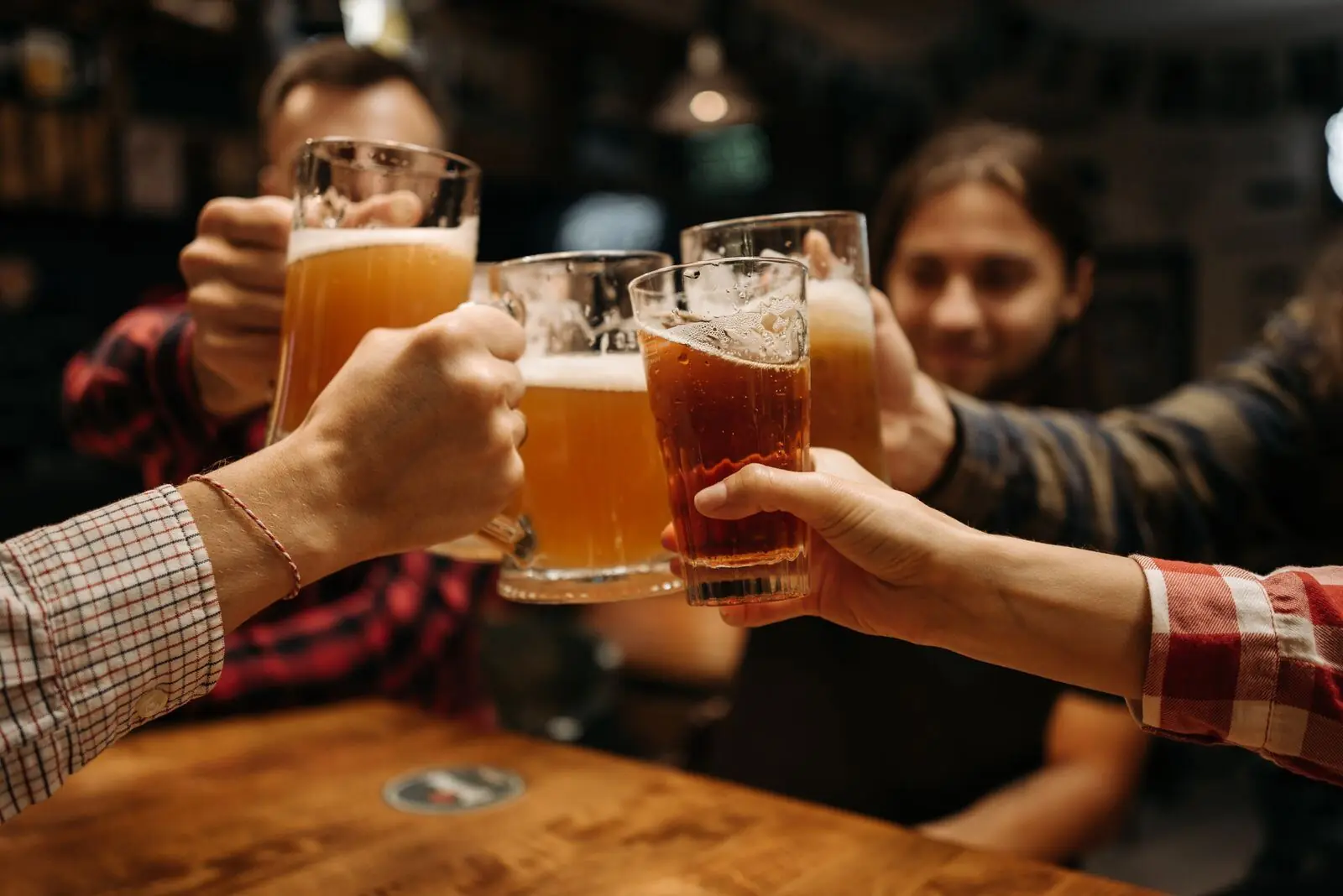Friends toasting in a pub